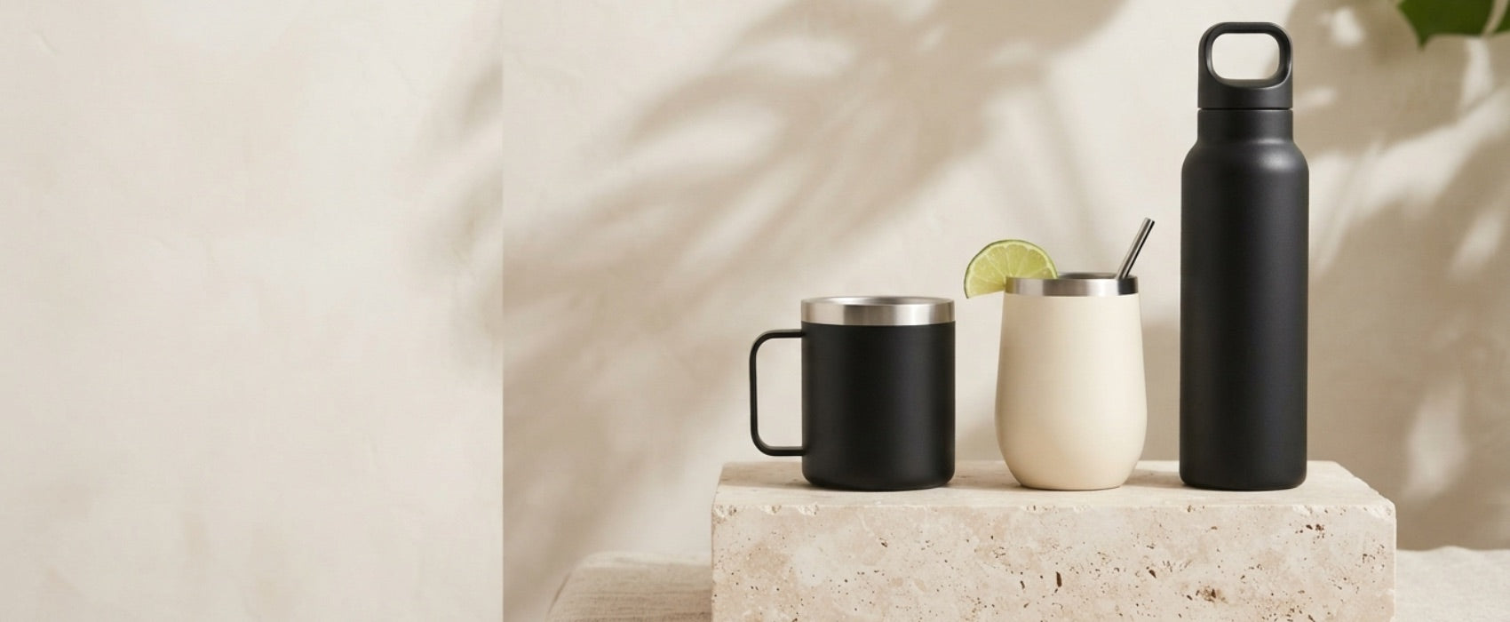 Three Magcheer drinkware styles arranged on a light stone pedestal