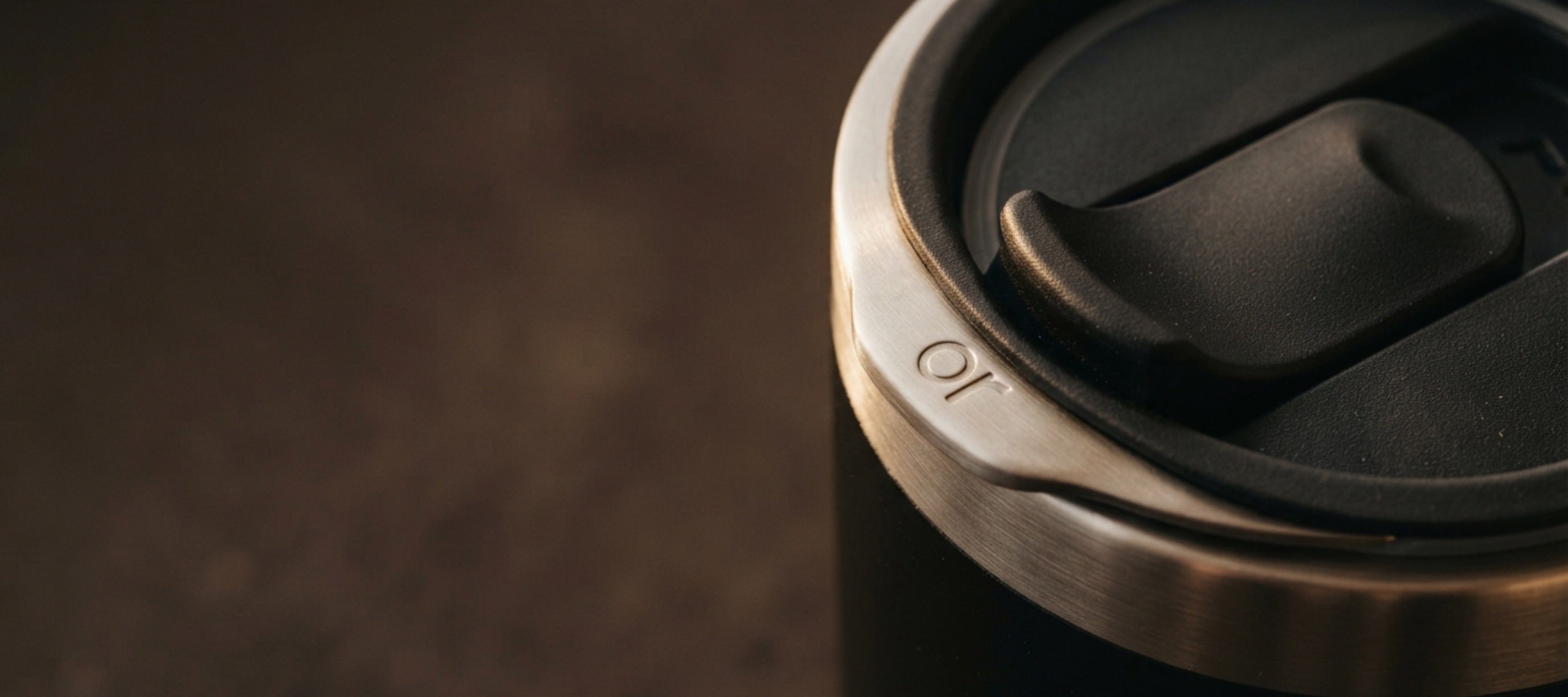 Close-up of a Magcheer tumbler lid and stainless steel rim
