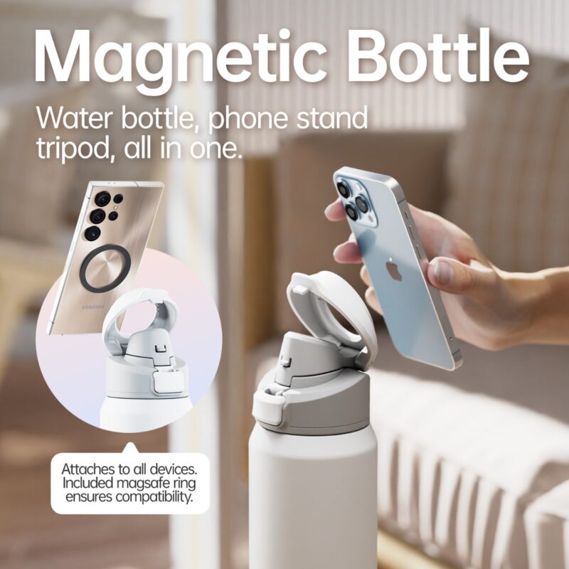 A magnetic water bottle with a phone stand feature. A hand holds a smartphone near the bottle's magnetic lid, ready to attach and use as a tripod